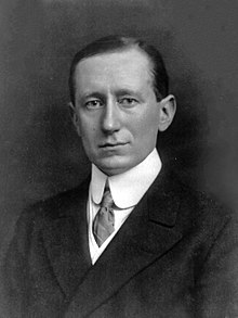 Guglielmo Marconi empirically found that he could just ground the transmitter (or one side of a transmission line, if used) dispensing with one half of the antenna,
